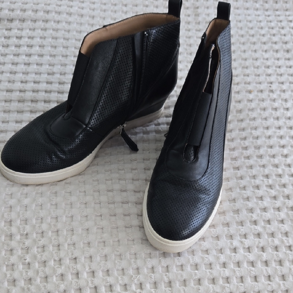 Linea Pelle Black Perforated Leather Slip-On Ankle Booties with White Sole